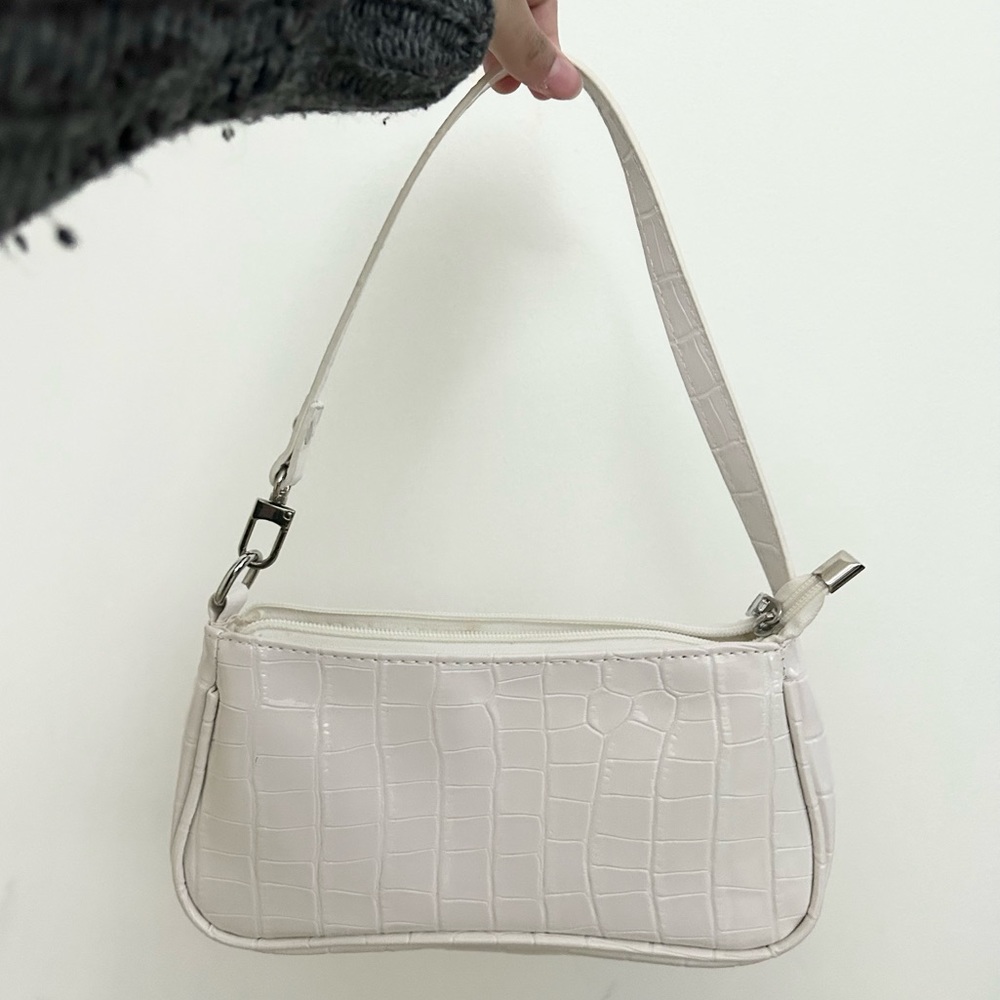 White snakeskin bag